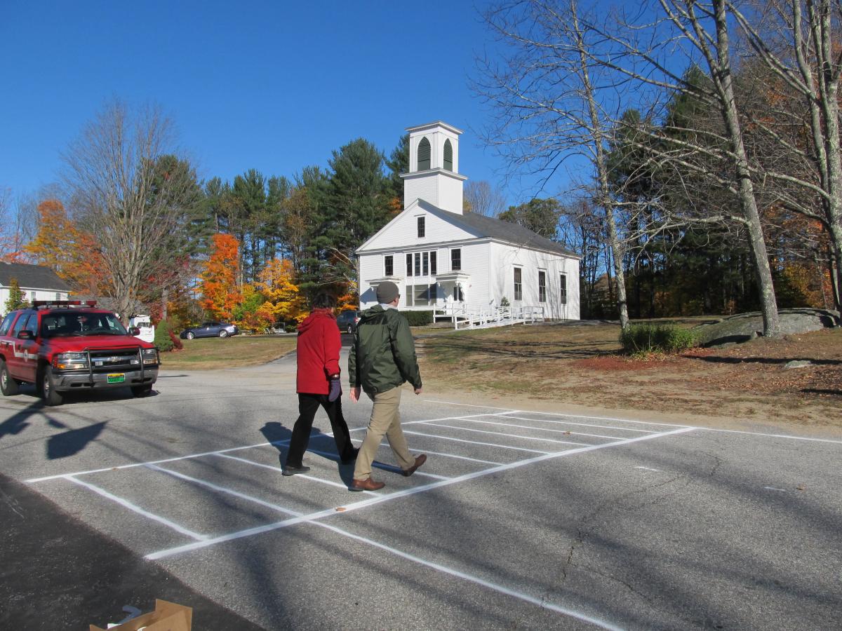 SNHPC staff use a hand-painted crosswalk to demonstrate pedestrian safety in Deerfield (Oct. 2016)
