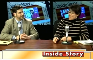 An image of Todd Fahey of AARP and Sylvia von Aulock of SNHPC interacting on a television program segment titled Inside Story
